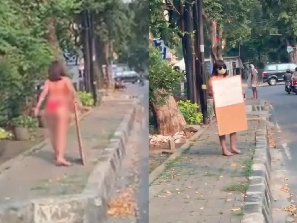 Dinar Candy saat melakuka aksi berbikini di pinggir jalan. (Twitter)