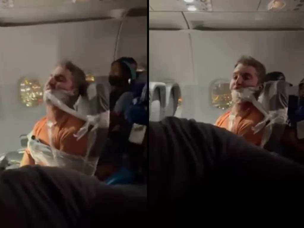 Seorang pria mabuk bikin keributan di penerbangan Frontier Airlines berhasil diikat oleh pramugari dengan selotip. (Istimewa)