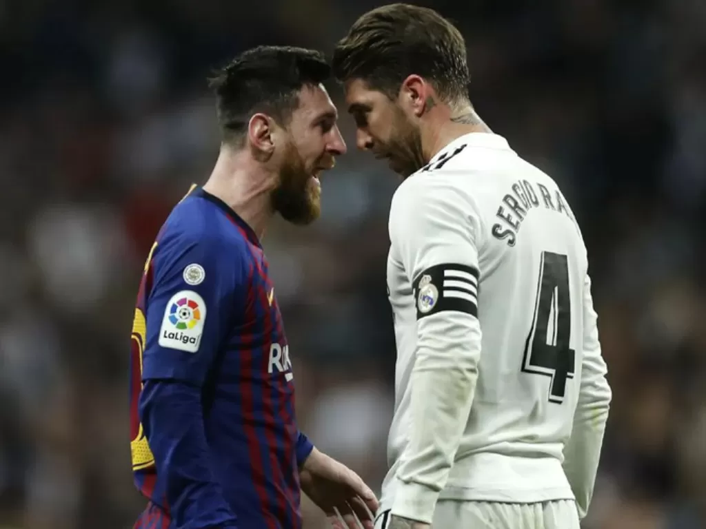 Lionel Messi dan Sergio Ramas saat laga El Clasico. (La Liga)