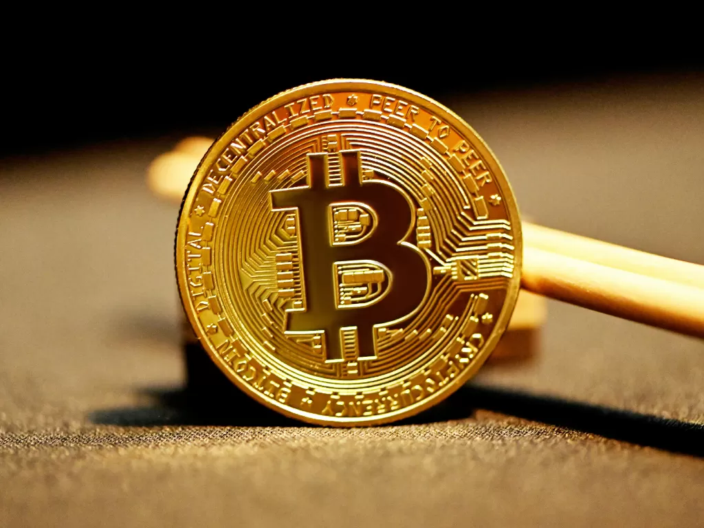 Ilustrasi mata uang digital Bitcoin (Ilustrasi/Unsplash/Executium)