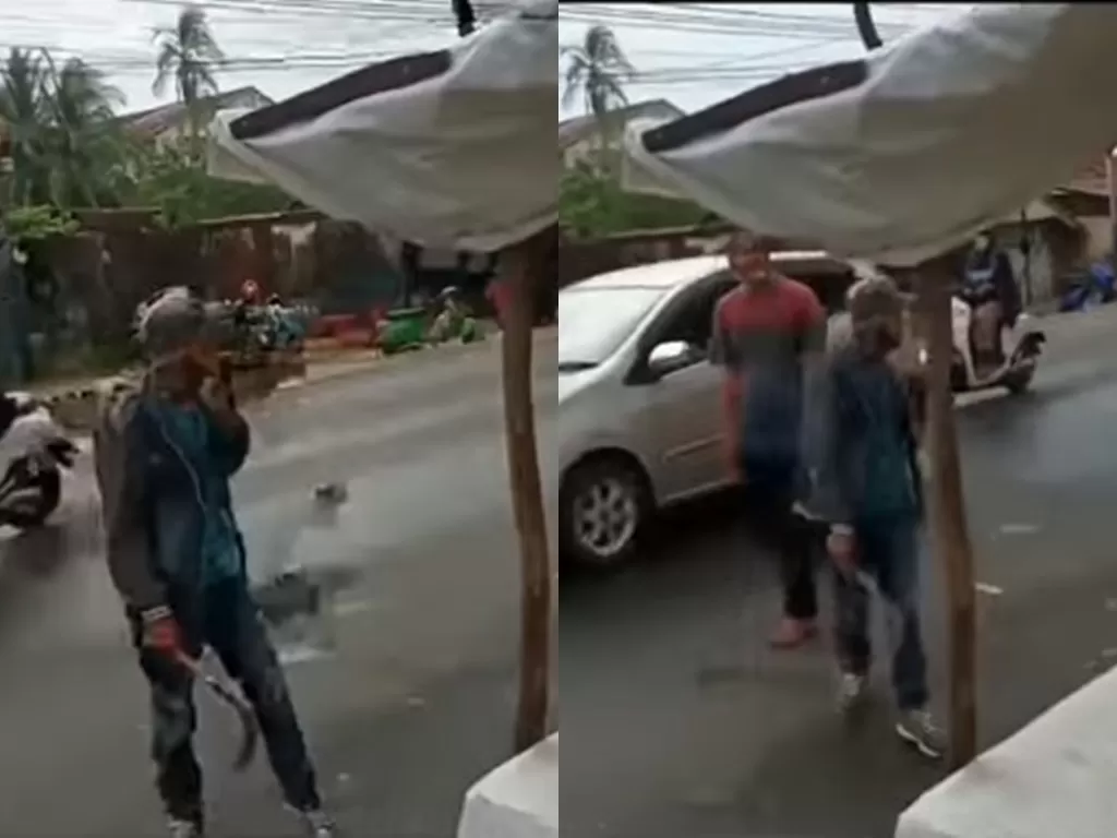 Aksi koboi tukang parkir todongkan celurit ke warga di Palembang (Instagram/video_jurnalis)