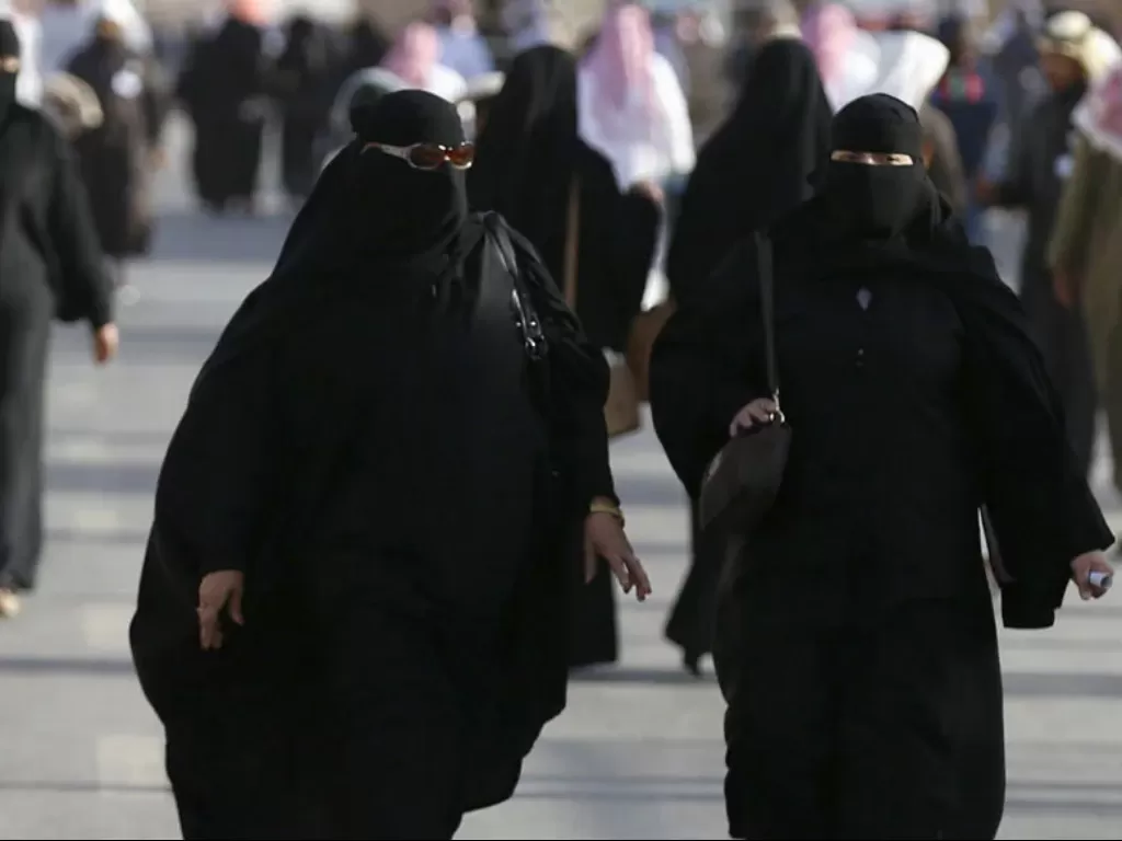 Ilustrasi - Perempuan mengenakan burqa. (News18)
