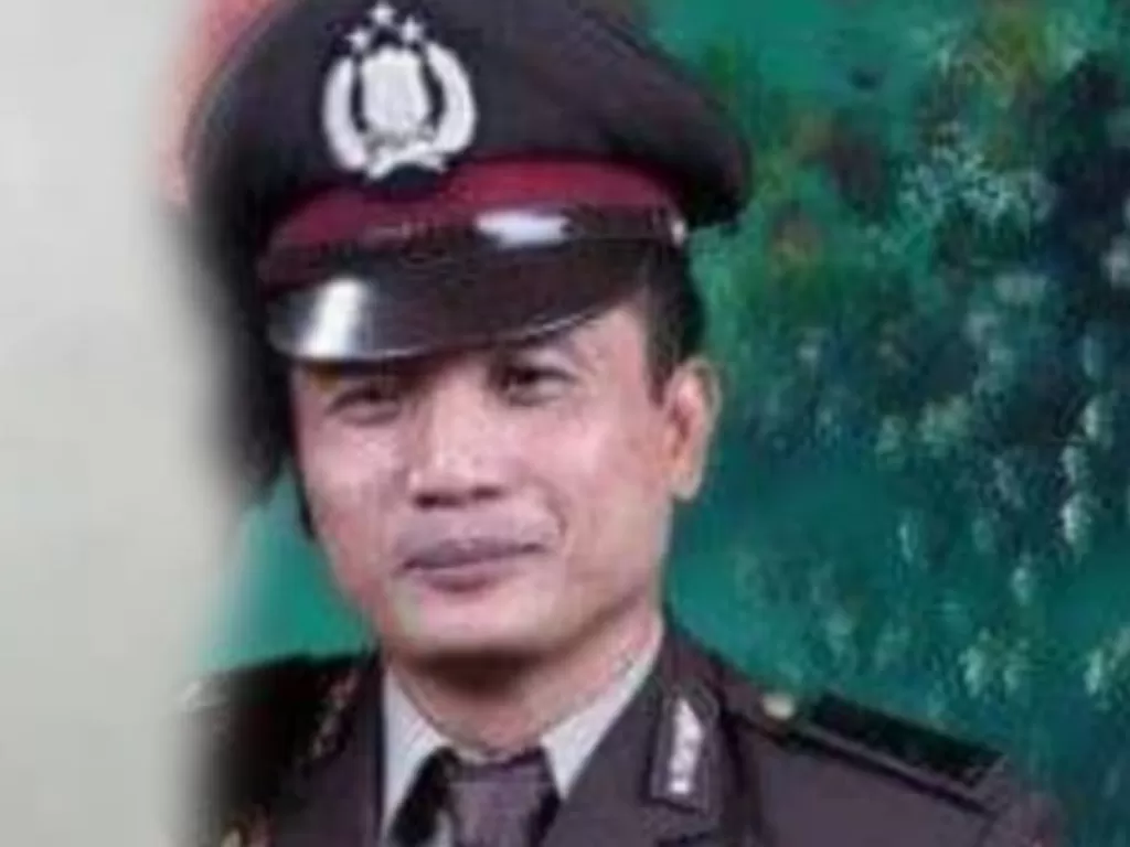 Aiptu Josmer Manurung tewas ditembak keponakan sendiri. (Foto/Ist)