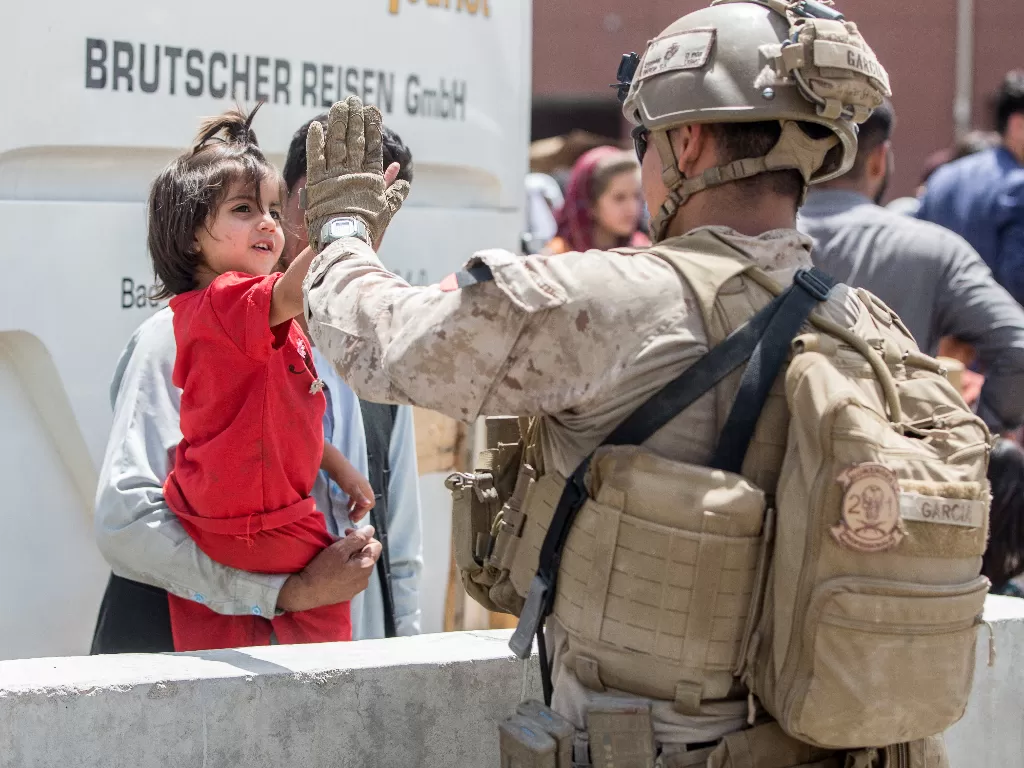 Tentara AS di Afghanistan. (photo/U.S. Marine Corps/Sgt. Samuel Ruiz/Handout via REUTERS)