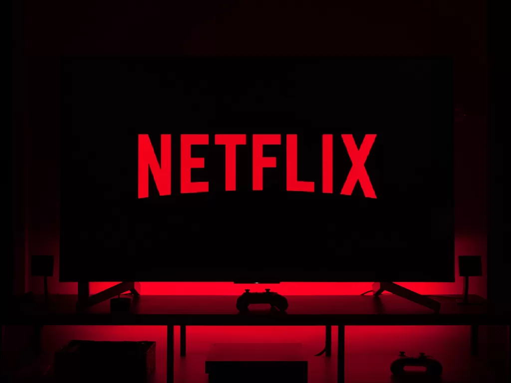 Tampilan logo layanan streaming film Netflix (Ilustrasi/Unsplash/Thibault Penin)