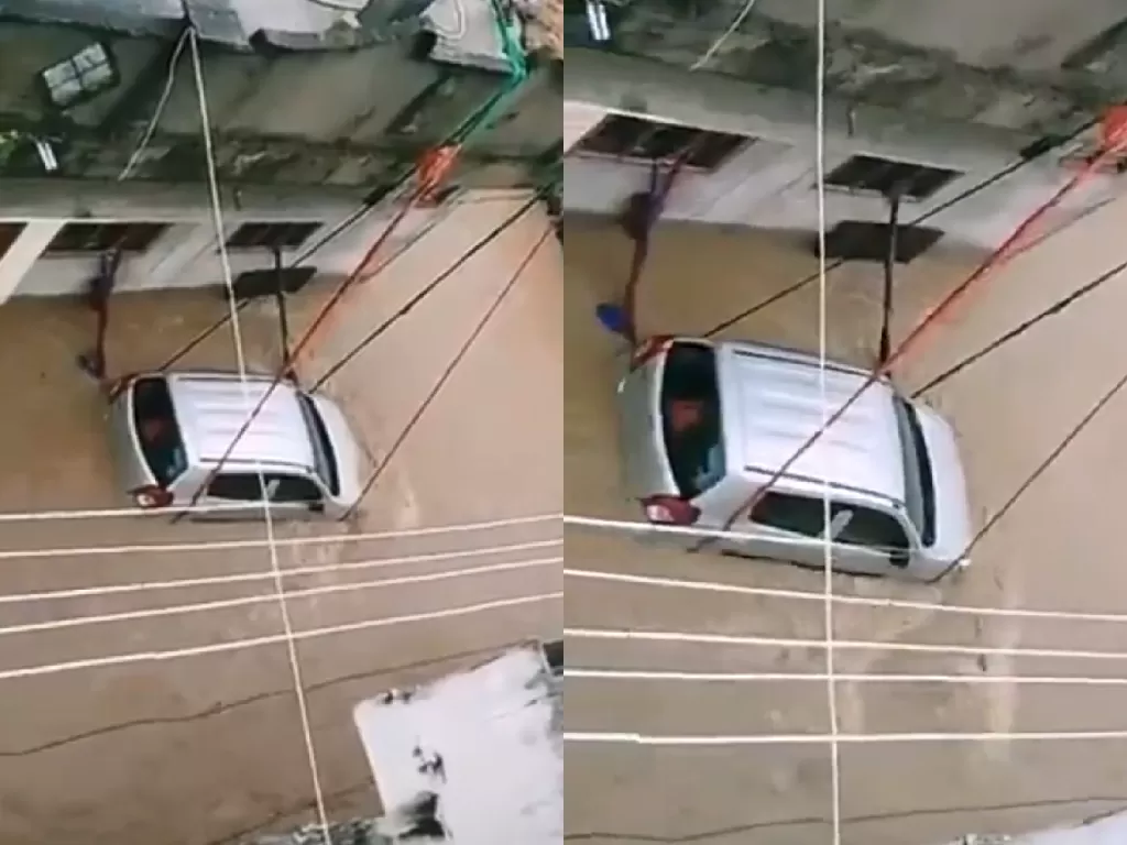 Pemilik mobil di India yang ikat mobilnya ke rumah agar tak terseret banjir (photo/Twitter/@TheSiasatDaily)