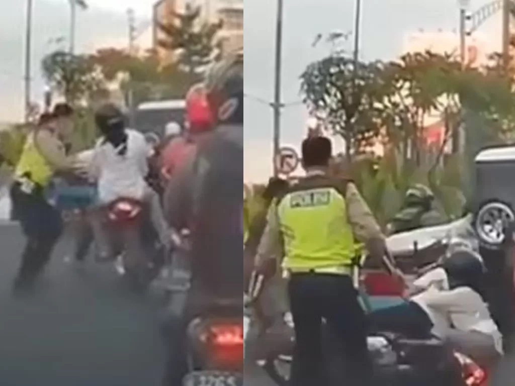 Video viral polisi mendorong pengendara motor hingga jatuh terjungkal di jalanan (Istimewa)