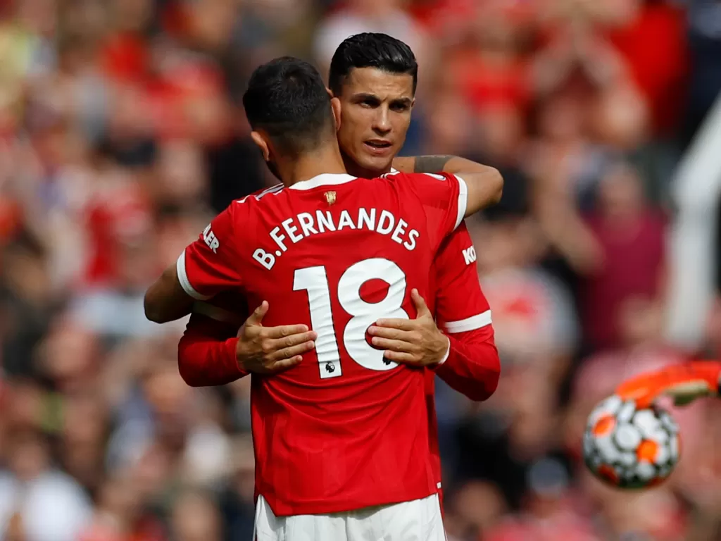 Bruno Fernandes dan Cristiano Ronaldo. (photo/REUTERS/Phil Noble)
