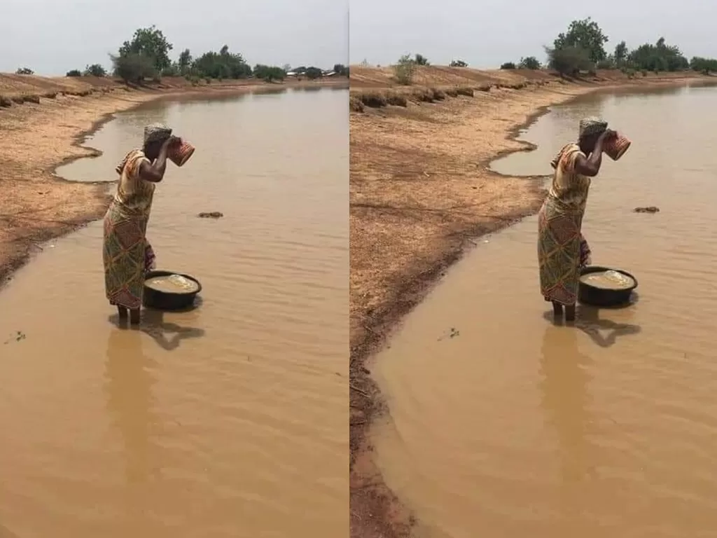 Seorang perempuan diduga berasal dari Afrika meminum air danau yang keruh melalui sebuah ember (Twitter/@EdithSkyz)
