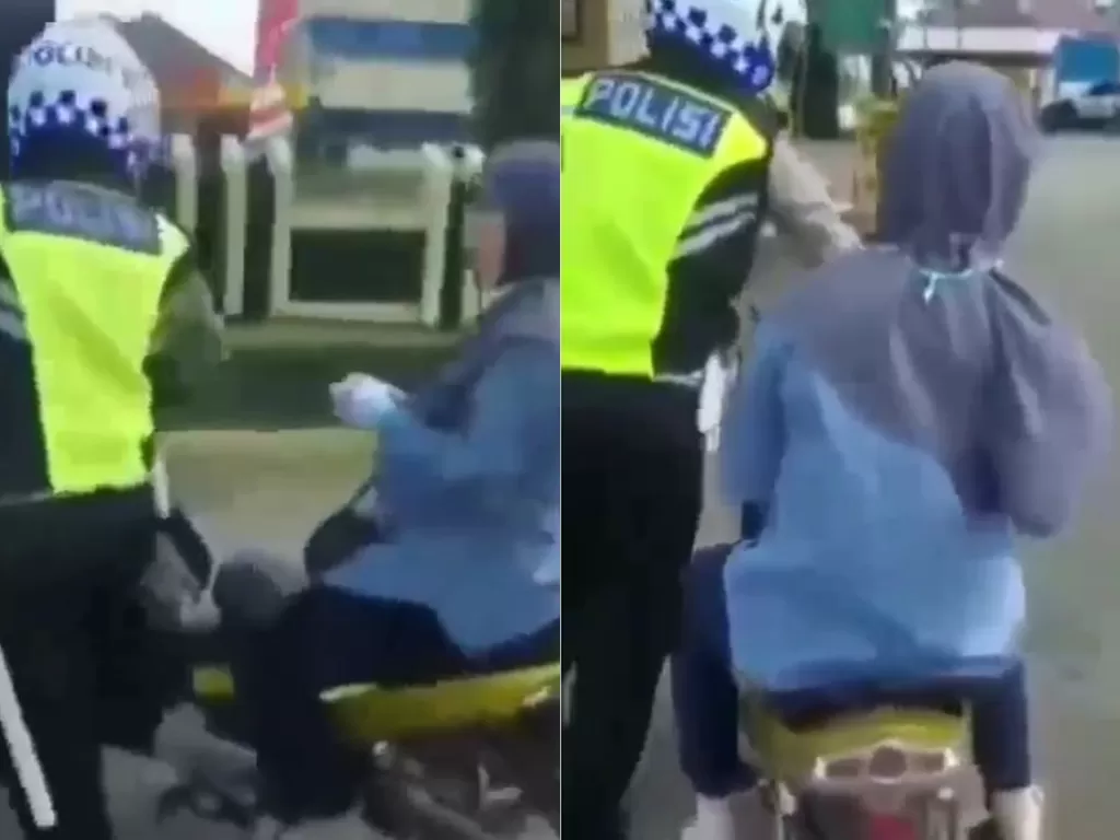 Ibu-ibu didorong petugas di atas motor karena ngotot tak mau ditilang (Instagram/lambeturah_official)