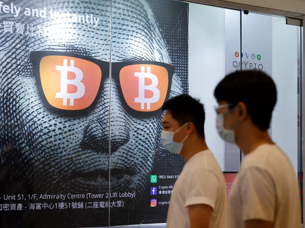 Iklan penggunaan Bitcoin di Hong Kong (Ilustrasi/REUTERS/Tyrone Siu)