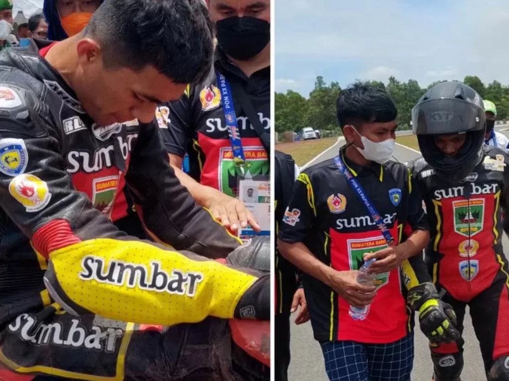 Dua pembalap motor Sumatera Barat erjatuh pada perlombaan kelas modifikasi beregu PON Papua XX Papua di Sirkuit Tanah Miring (ANTARA/ Mario Sofia Nasution)