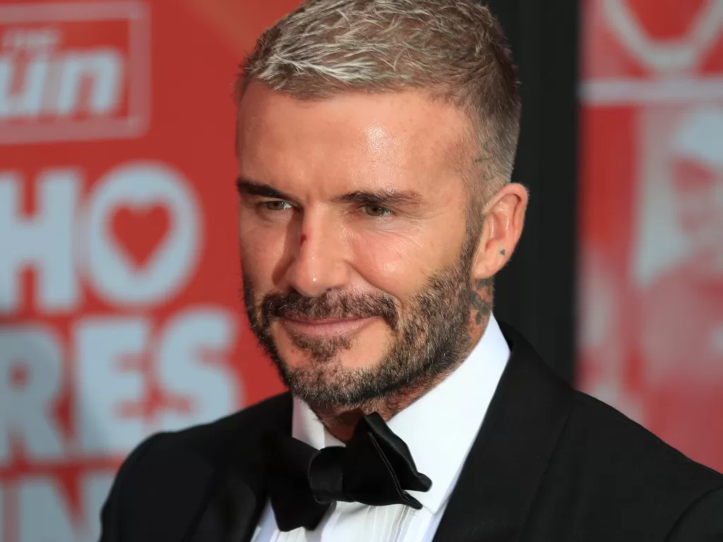 David Beckham saat hadiri sebuah acara The Sun's Who Cares Wins Awards di London (REUTERS/May James)