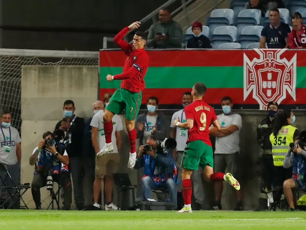 Cristiano Ronaldo merayakan golnya untuk Portugal ke gawang Qatar (REUTERS/Pedro Nunes)