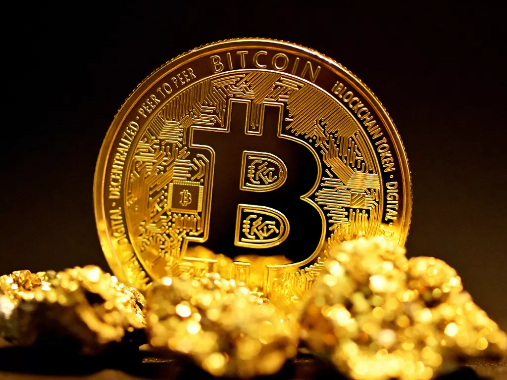 Ilustrasi mata uang kripto Bitcoin (photo/Unsplash/Executium)