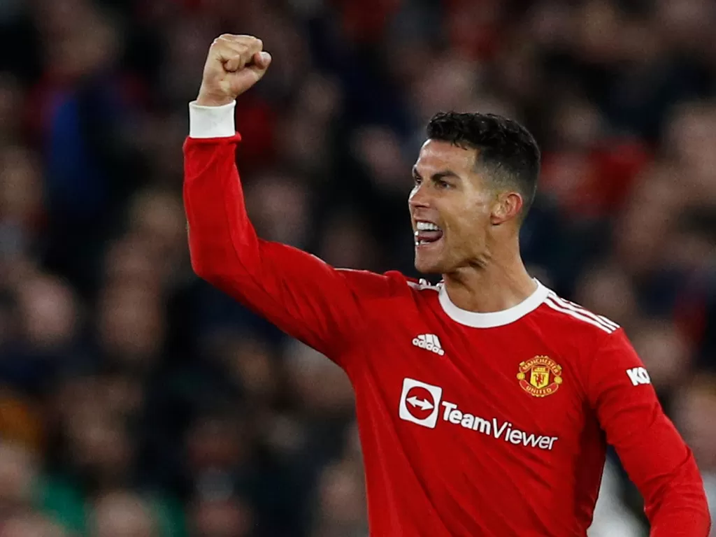 Selebrasi Cristiano Ronaldo usai mencetak gol ketiga untuk Manchester United (REUTERS/Phil Noble)