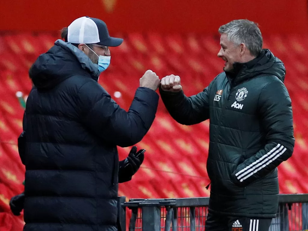 Jurgen Klopp, pelatih Liverpool dan Ole Gunnar Solskjaer, pelatih Man United (REUTERS/Phil Noble)