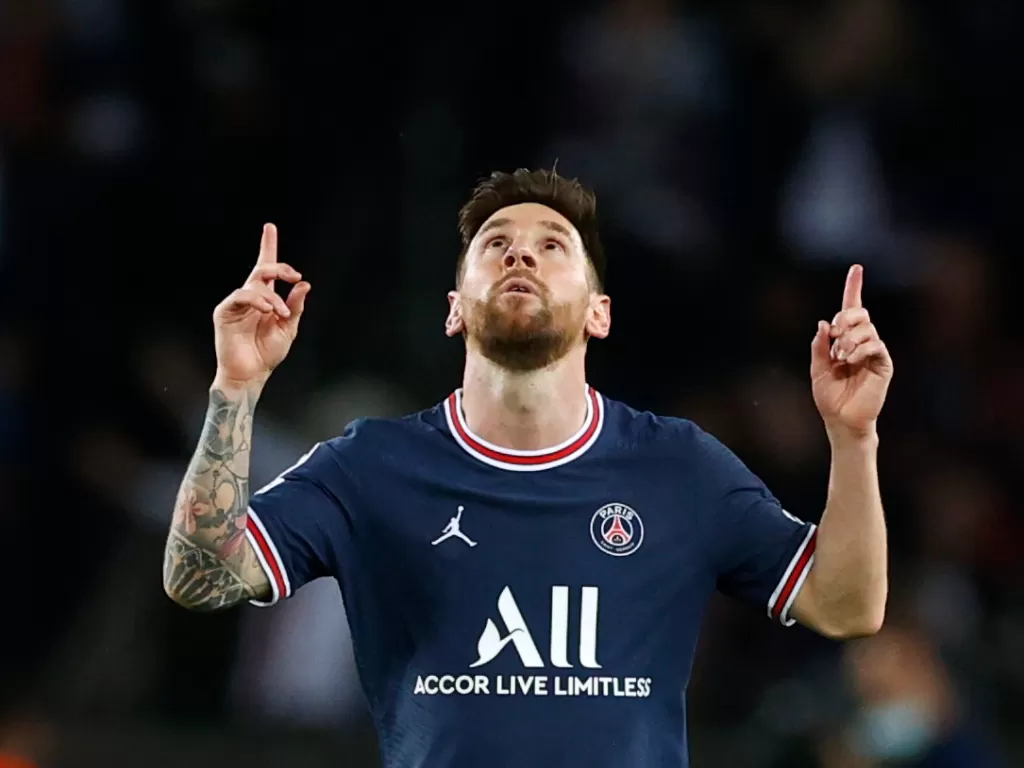 Lionel Messi berkostum PSG (REUTERS/CHRISTIAN HARTMANN)