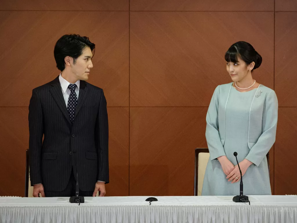 Putri Mako resmi menikahi kekasihnya Kei Komuro. (Nicolas Datiche/Pool via REUTERS)