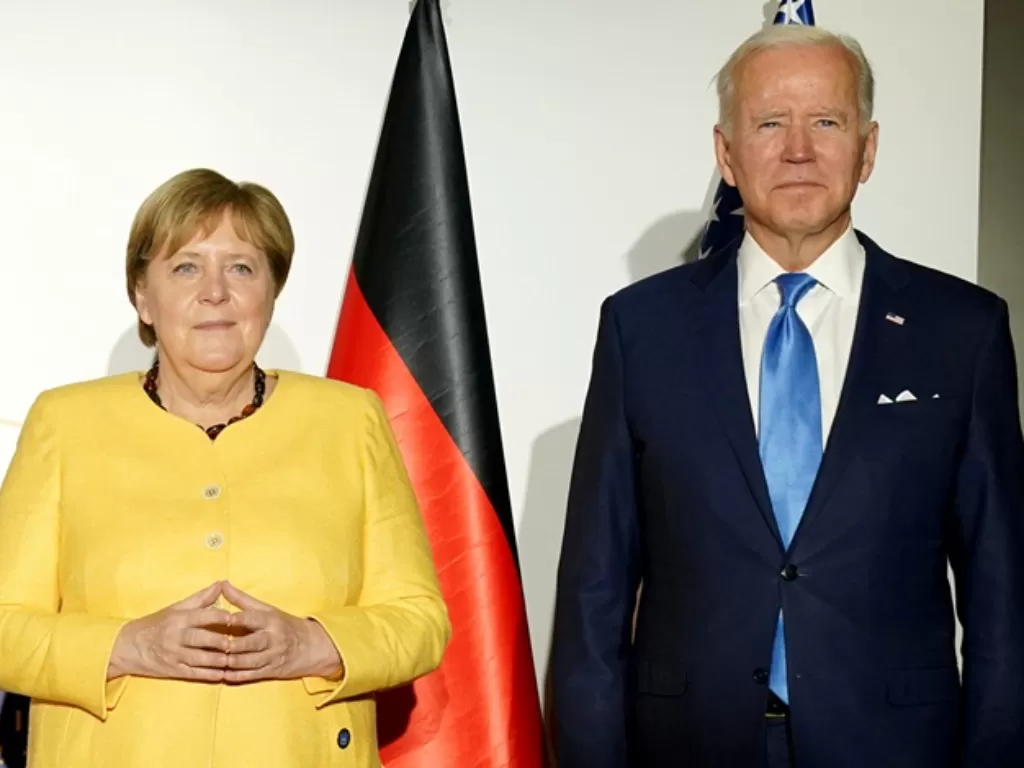 Kanselir Jerman Angela Merkel dan Presiden AS Joe Biden. (REUTERS/Kevin Lamarque)