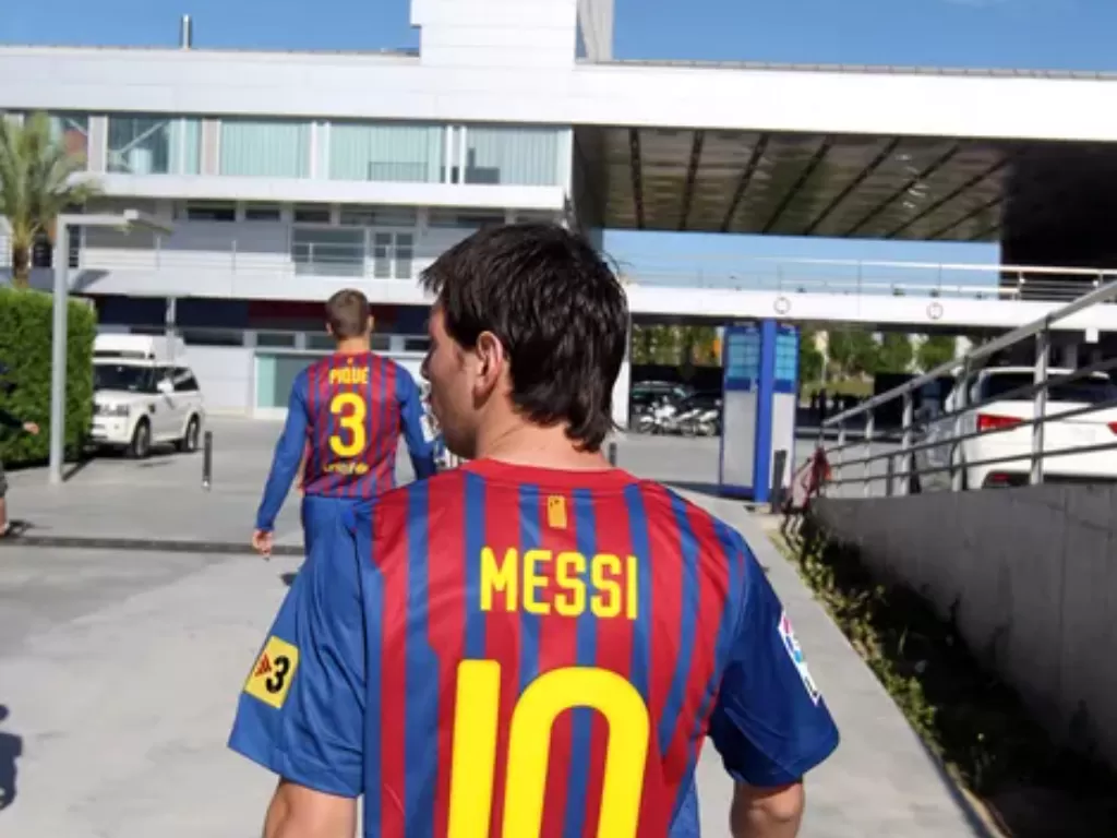 Lionel Messi dan Gerard Pique (Miguel Ruiz - FC Barcelona)