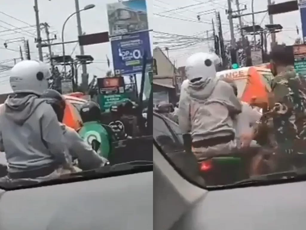Pemotor yang geber knalpot di jalan, langsung ditampol pria berseragam TNI. (Instagram/agoezbandz4)