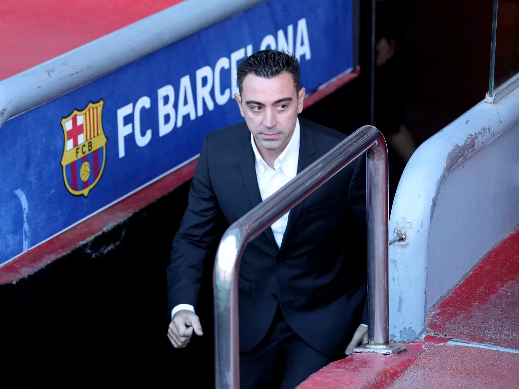 Xavi Hernandez saat diperkenalkan Barcelona (REUTERS/Albert Gea)