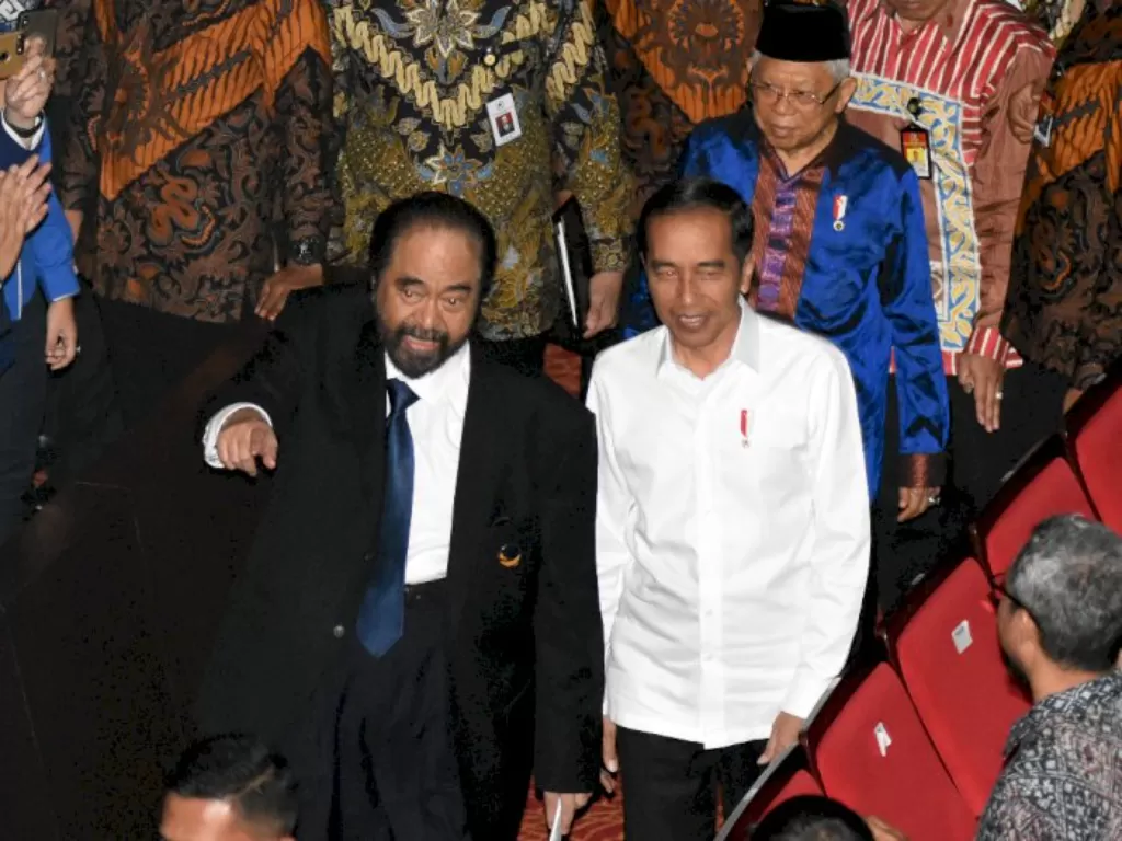 Presiden Jokowi dan Surya Paloh (photo: ANTARA/Indrianto Eko Suwarso)