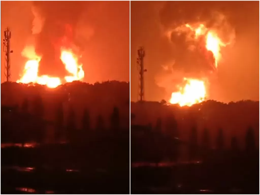 Cuplikan video viral tangki kilang Pertamina Cialacap terbakar, Sabtu (13/11/2021). (photo/Istimewa)