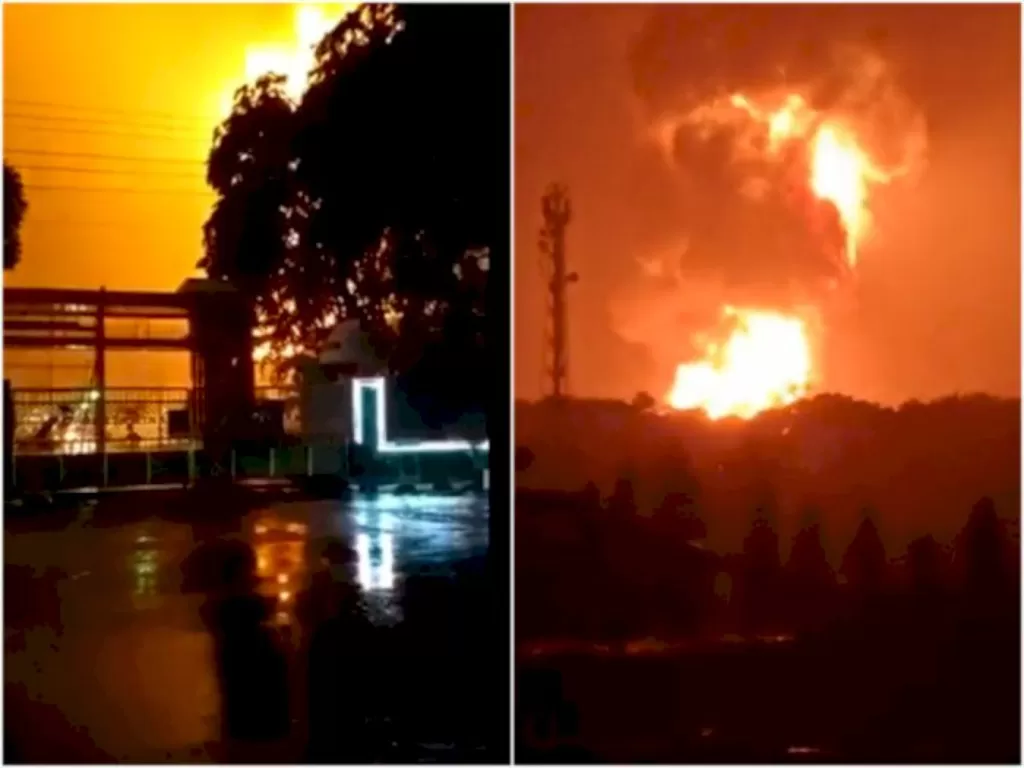 Tangkapan layar video viral tangki kilang Pertamina Cialacap terbakar, Sabtu (13/11/2021). (photo/Twitter/@marisauhp1)