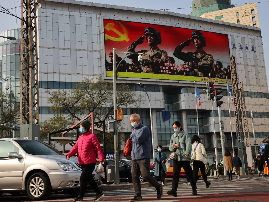 Penduduk China. (Foto/REUTERS/Thomas Peter)