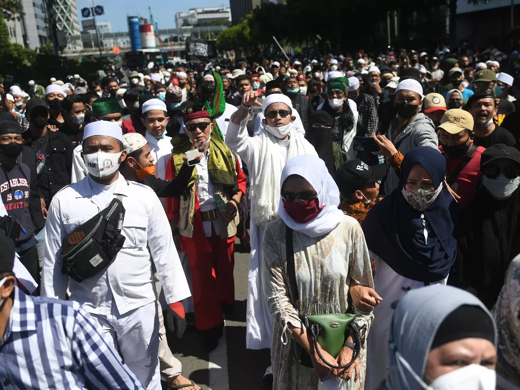 Sejumlah massa mengikuti aksi reuni 212 di Jakarta, Kamis (2/12/2021). (ANTARA/Akbar Nugroho Gumay/hp)