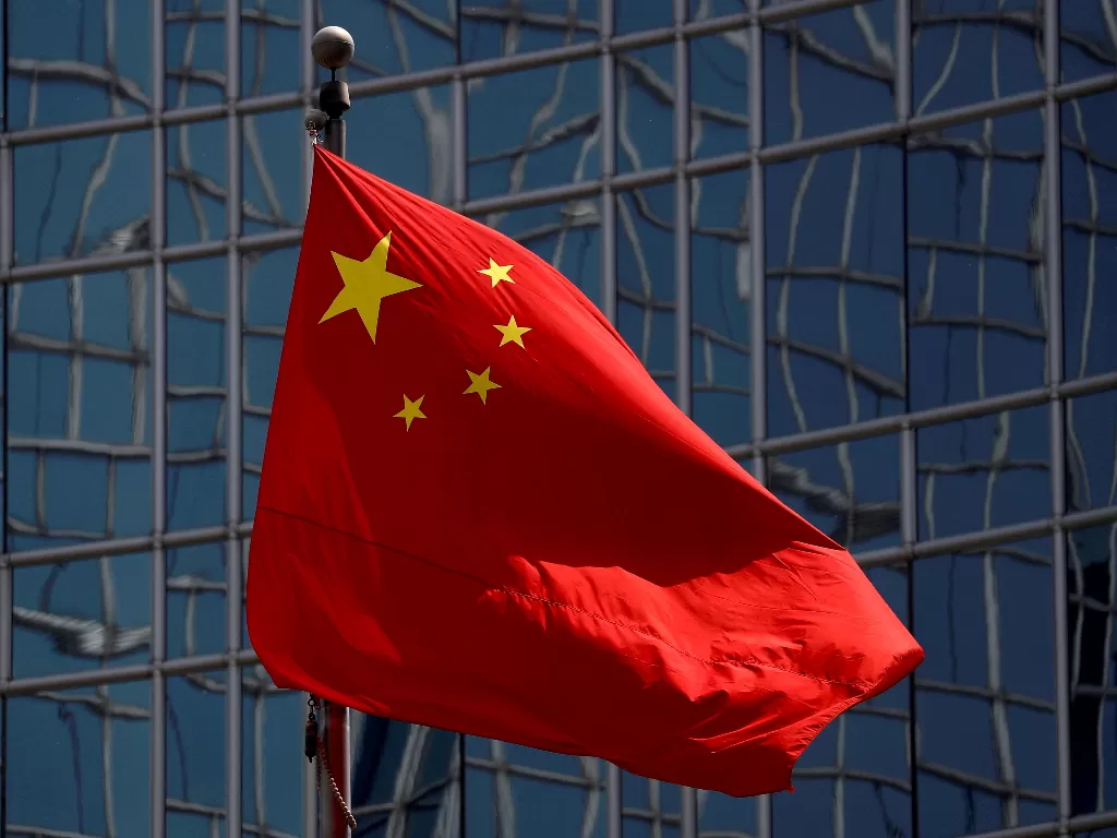 Bendera China. (REUTERS/Thomas Peter)