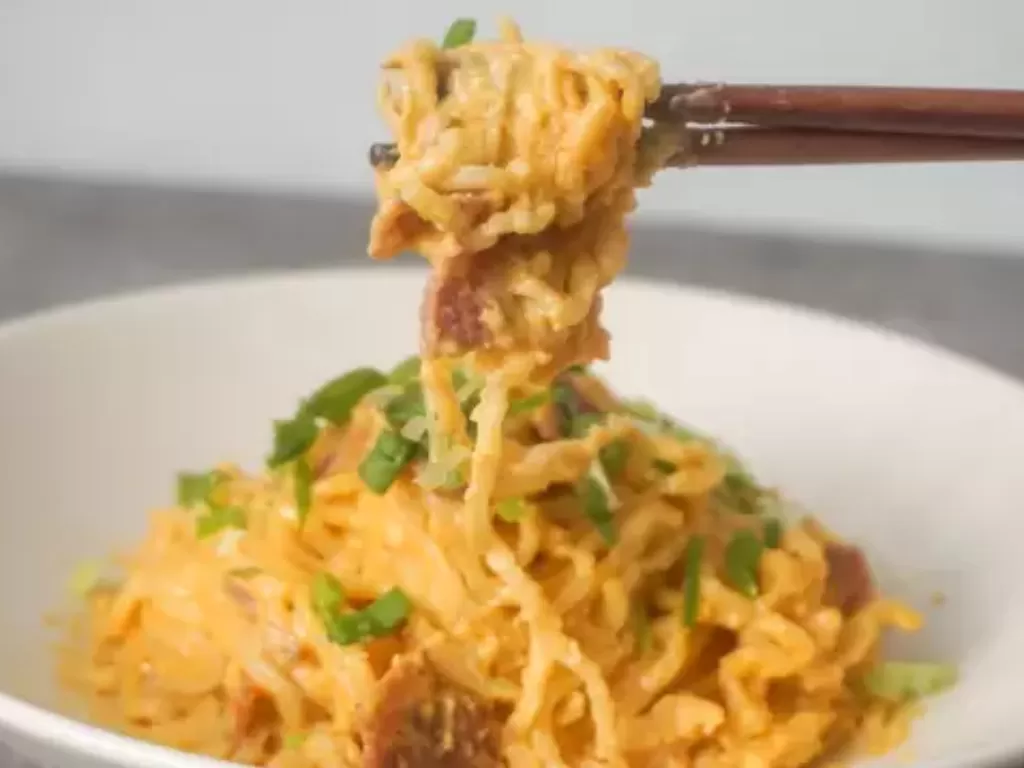 Mie Instan Goreng Cheezy (Cookpad/ILUSTRASI/Cheese Madness)