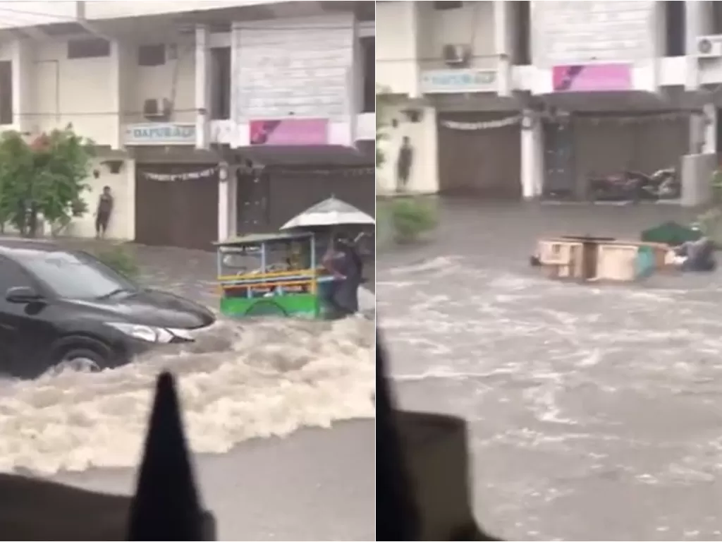 Mobil terobos banjir bikin pedagang terjatuh (Tiktok/djankoz77)