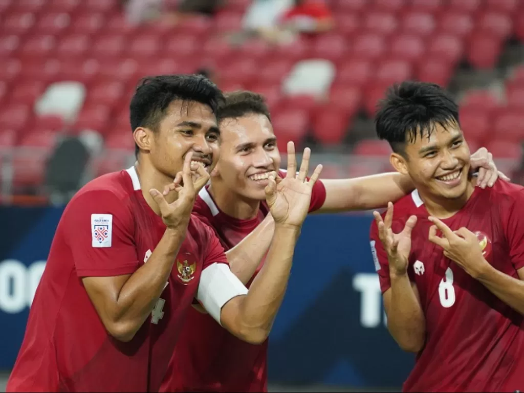Para pemain Timnas Indonesia merayakan keberhasilan mereka melaju ke Final Piala AFF 2020. (affsuzukicup.com)