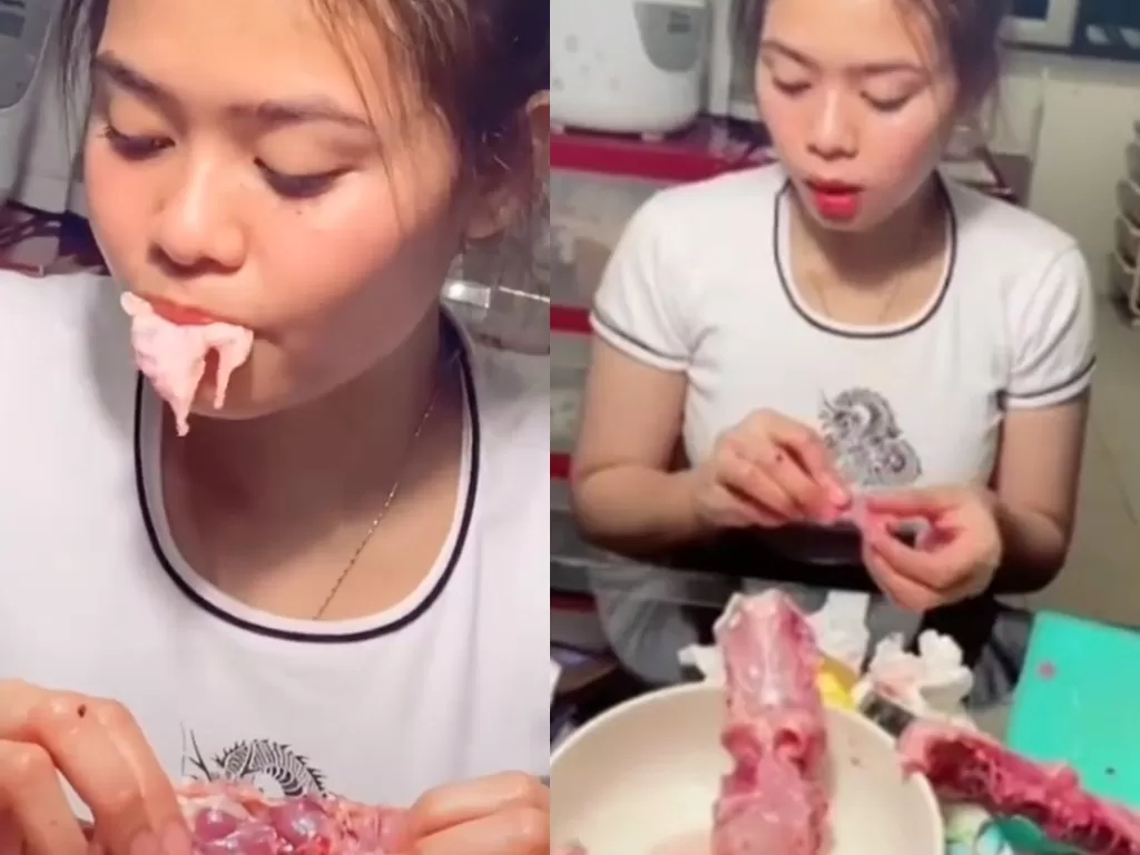 Tangkapan layar video wanita cantik makan daging ayam mentah (TikTok/ @aweky15zr)
