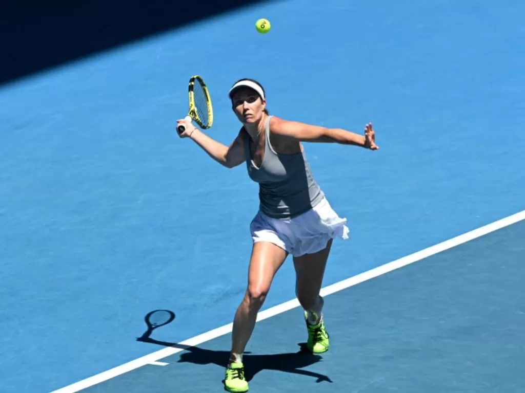 Petenis AS Danielle Collins beraksi selama pertandingan perempat final Australian Open melawan Alize Cornet dari Prancis di Melbourne Park, Melbourne, Australia, Rabu (26/1/2022). (ANTARA/REUTERS/Morgan Sette)