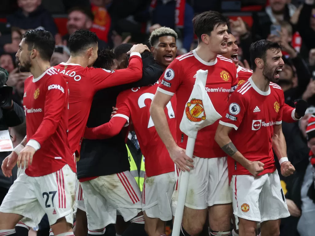 Pemain Manchester United selebrasi gol. (REUTERS/Phil Noble)