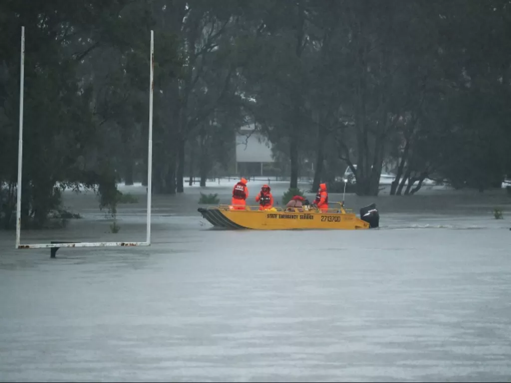 Banjir bandang terjang salah satu kota di Australia, Brisbane. (REUTERS/Jason O'Brien)