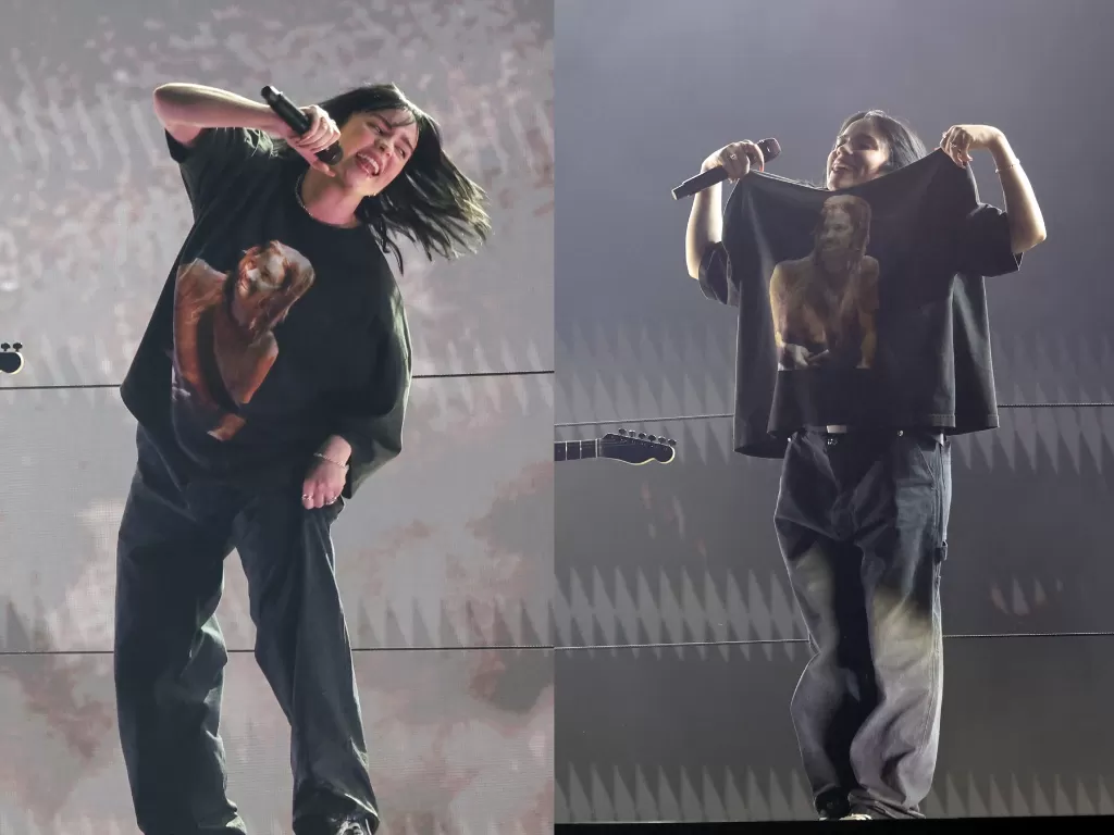 Billie Eilish mengenakan kaos bergambar wajah drummer Foo Fighters, Taylor Hawkins dalam penampilannya di Grammy Awards 2022, Minggu (3/4/2022) waktu setempat (REUTERS/Mario Anzuoni)