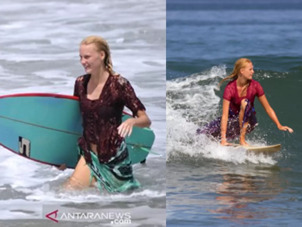 Wisatawan asing perempuan mengikuti aktivitas surfing di Pantai Kuta, Badung, Bali. (Antara/Fikri Yusuf/Nyoman Hendra Wibowo)