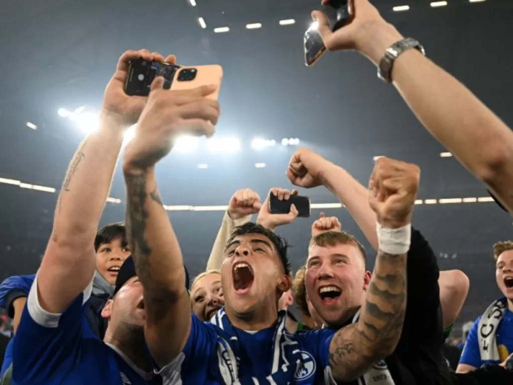 Pemain Schalke 04 merayakan kemenangan. (Antara/AFP/INA FASSBENDER)
