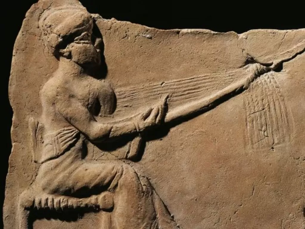 Ilusrtasi bangsa Sumeria menenun. (History)