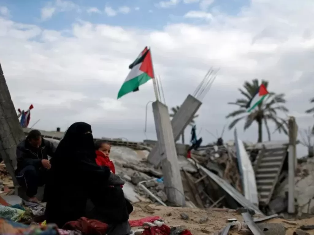 Kondisi reruntuhan pemukiman warga di Palestina yang hancur lebur. (REUTERS/MOHAMMED SALEM)