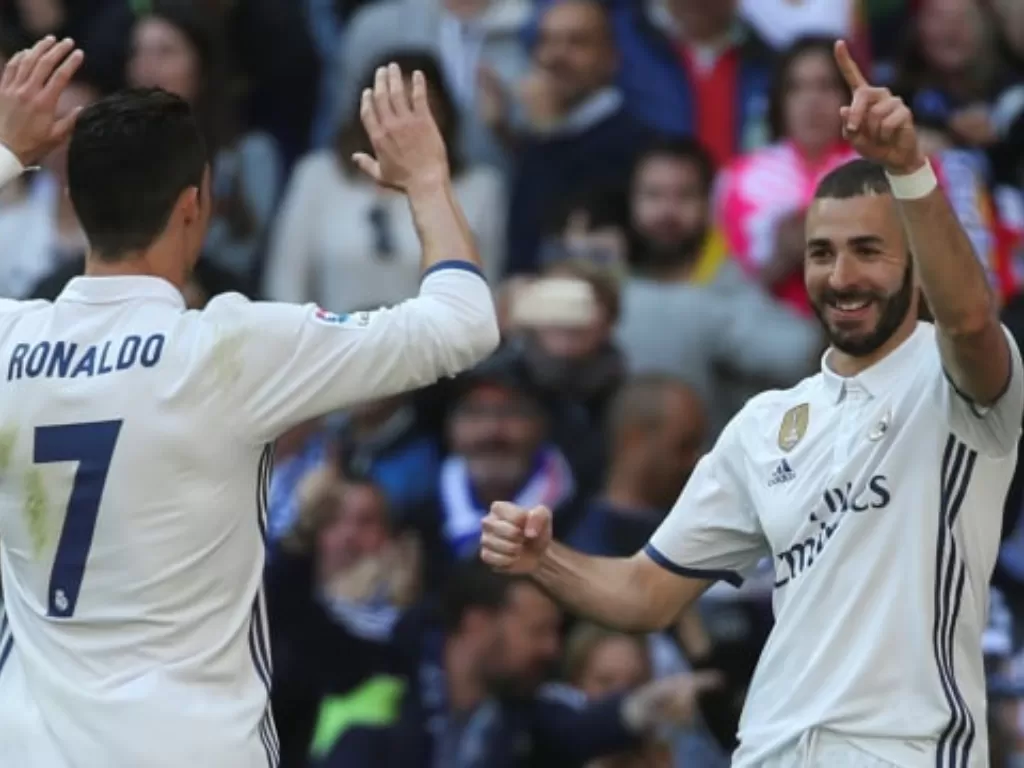 Karim Benzema dan Cristiano Ronaldo saat masih menjadi tandem di Real Madrid. (REUTERS/Sergio Perez)