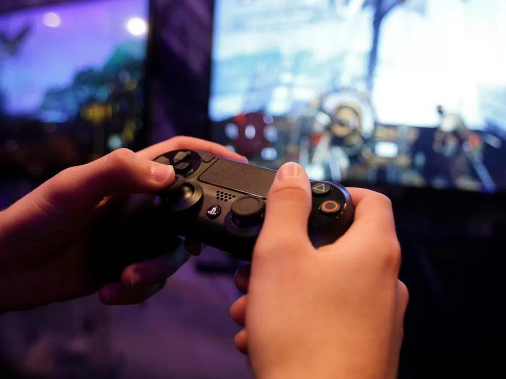 Sony tak akan rilis game first party di PS4. (REUTERS/Ina Fassbender)
