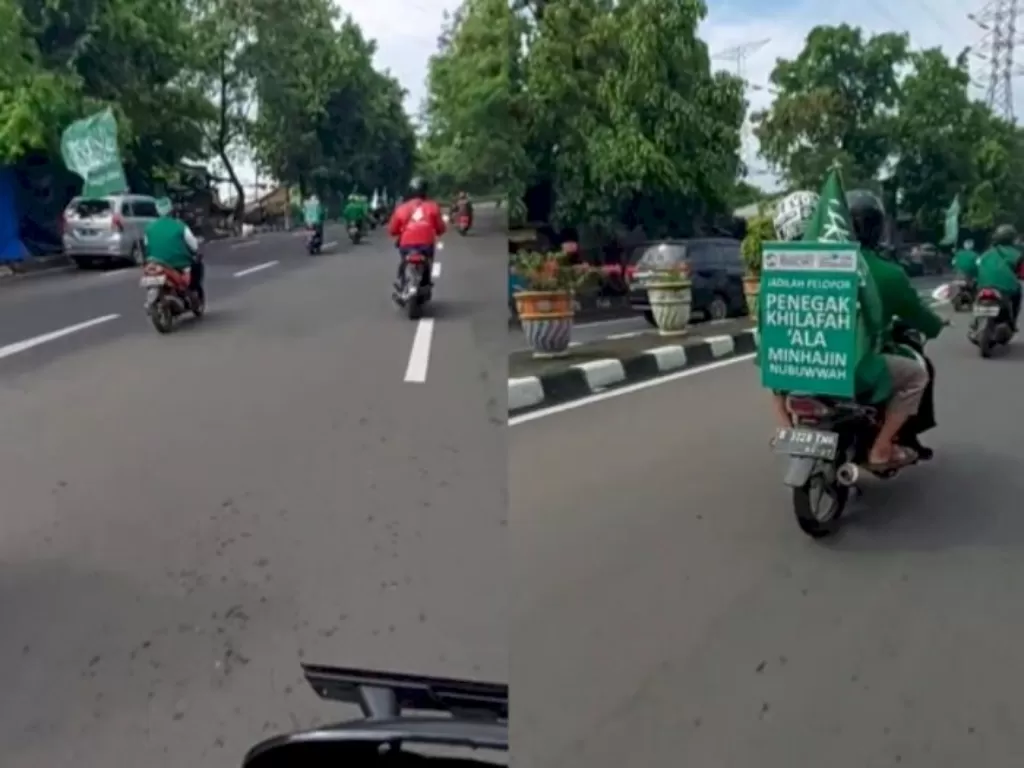 Tangkapan layar konvoi pengendara sepeda motor membawa atribut Khilafah. (Twitter/@Miduk17)