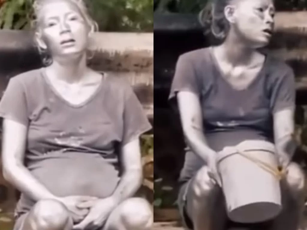 Wanita hamil mengamen jadi manusia silver. (Instagram/@say.video)