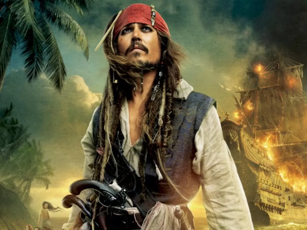 Johnny Depp dalam film Disney Pirates of Caribean sebagai Jack Sparrow. (Disney).